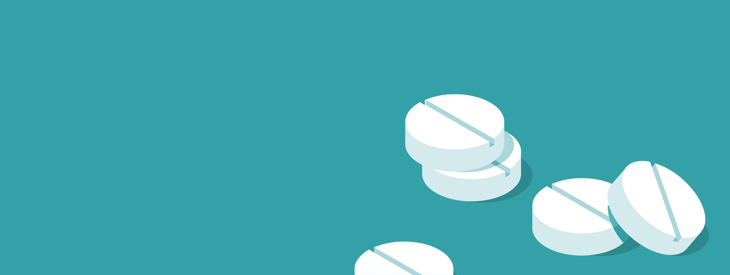 White pills on a green background